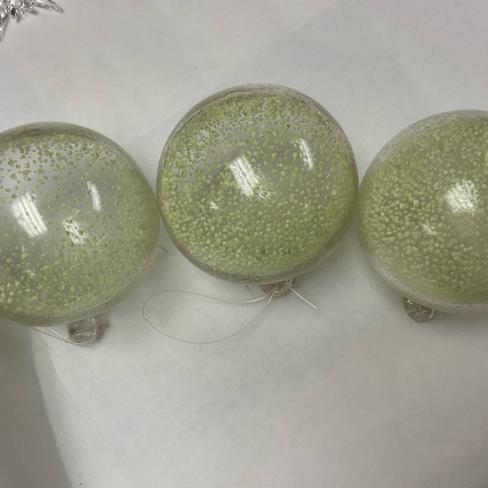 Elegant Glow in the Dark Glass Orbs